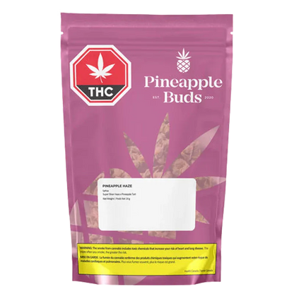 Front-facing photo of the magenta Pineapple Buds Pineapple Haze pouch with a white label, pineapple logo, and THC warning badge.