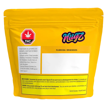 Front-facing yellow pouch labeled "Nugz Florida Oranges" with a THC symbol, blank white label area, and warning text at the bottom.