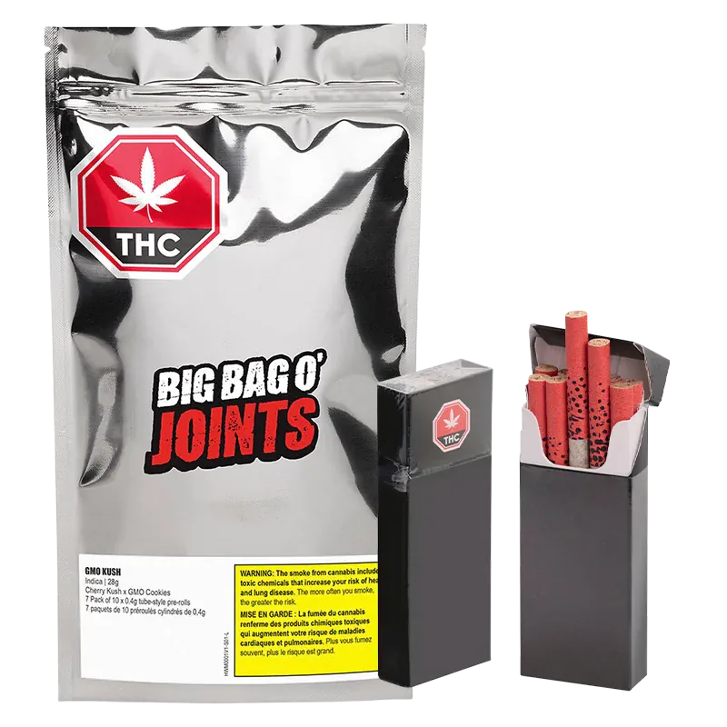 Front view of a reflective silver pouch and two black boxes with red-filtered joints, labeled GMO Kush PR 70 x 0.4 g.