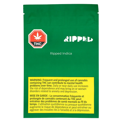 Flat front view of the green Ripped Indica packaging with a white RIPPED logo, THC symbol at top left, and a yellow health warning panel at the bottom