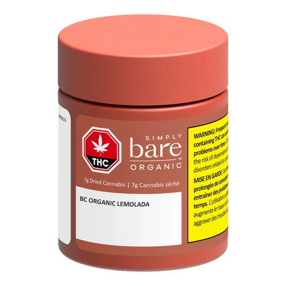 Front three-quarter view of a coral jar labeled "BC Organic Lemolada" from Simply Bare Organic with a THC symbol and yellow warning panel.