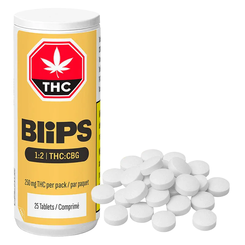Three-quarter view of a yellow Blips 1:2 THC:CBG Tablets bottle standing next to a scattered pile of white round tablets on a white background