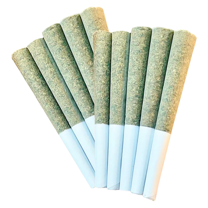 Top-down view of eight fanned Dual Pre PR 20 x 0.5 g pre-rolled cones with green herbal fill and white paper tips.