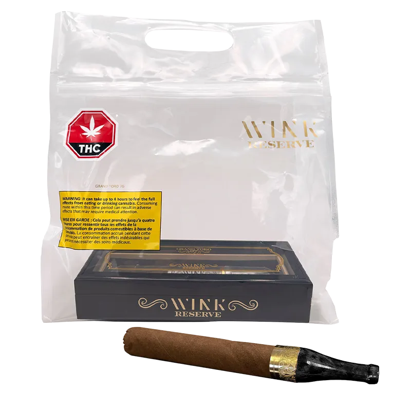 A front-facing shot of a Reserve Grand Toro G7 PR 1 x 7 g cigar and its black Wink Reserve box inside a clear plastic retail bag.