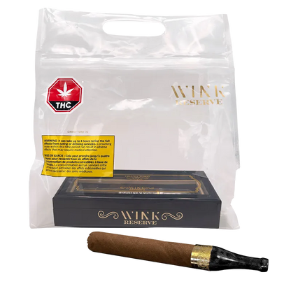 A front-facing shot of a Reserve Grand Toro G7 PR 1 x 7 g cigar and its black Wink Reserve box inside a clear plastic retail bag.