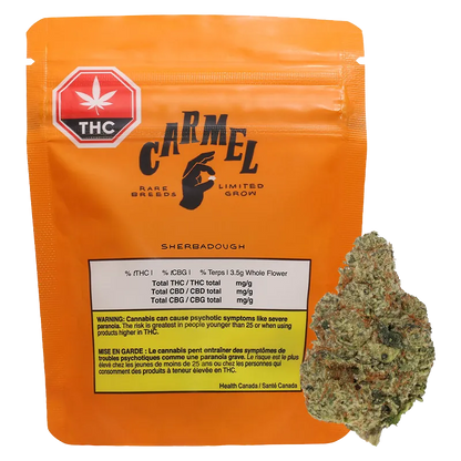 Front-facing shot of the orange Carmel Sherbadough pouch with a THC symbol at top left and a cannabis bud resting to its right.