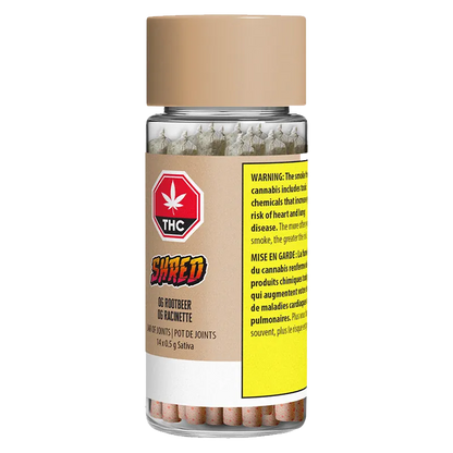 Straight-on product shot of a clear jar labeled "Og Rootbeer Jar Of Joints PR 14 x 0.5 g" showing a beige cap, visible packed joints inside, and a tan and yellow warning label.