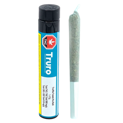 Vertical studio shot of a Truro Truffle Treats PR 1 x 0.5 g tube standing beside its pre-rolled joint against a white background.