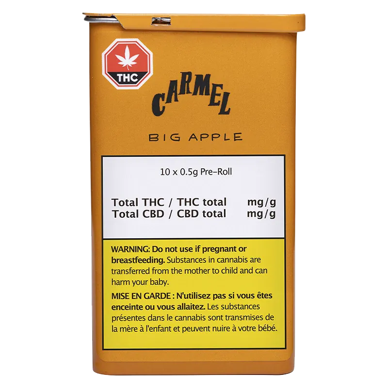 Front view of the mustard-yellow tin labeled Big Apple PR 10 x 0.5 g with "Carmel" logo and a white info panel and warning block.