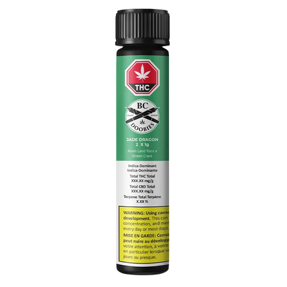 Tall front view of the Jade Dragon PR 2 x 1 g tube with green label, THC symbol, brand crest, and yellow warning panel.