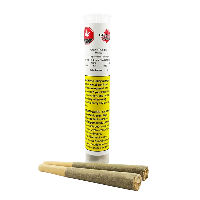 Tall front view of the Organic Thunder Zkittlez PR 2 x 1 g white tube with yellow warning label, shown behind three rolled pre-rolls on a white background