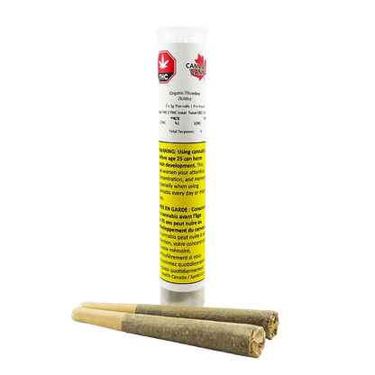 Tall front view of the Organic Thunder Zkittlez PR 2 x 1 g white tube with yellow warning label, shown behind three rolled pre-rolls on a white background
