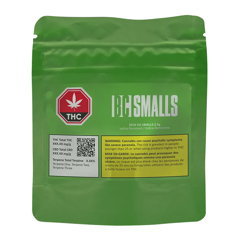 Front-facing shot of the green Deja Vu Smalls resealable pouch with white "BC SMALLS" logo, red THC symbol, and yellow warning panel.
