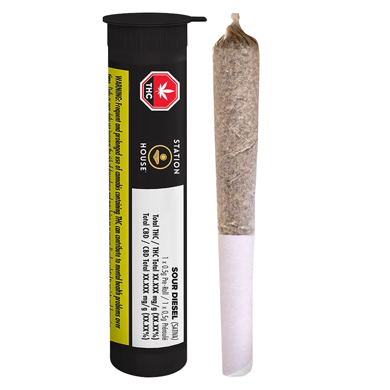 Vertical studio shot of a Station House Sour Diesel PR 1 x 0.5 g pre-roll standing beside its black labeled tube, on a white background.
