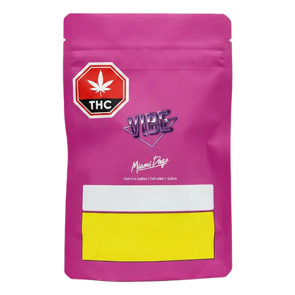 Front view of the vibrant pink Miami Daze PR 14 x 0.5 g pouch with VIBE logo, THC icon, and blank white and yellow label panels.