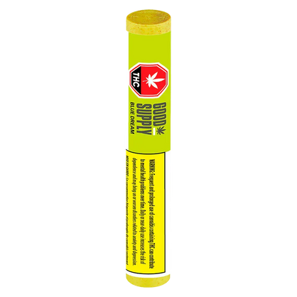 Vertical studio shot of the Blue Dream Vape Cartridge in bright lime packaging labeled Good Supply Blue Dream with a red THC stop sign emblem.
