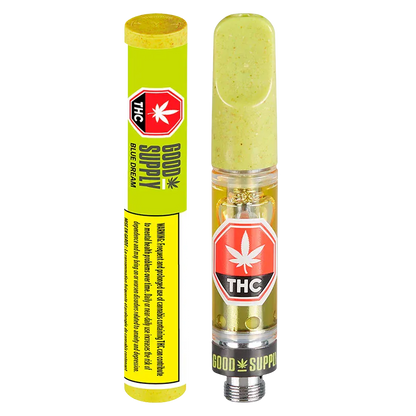 Straight-on product shot of a Good Supply Blue Dream Vape Cartridge showing the clear cartridge with gold oil and a green speckled mouthpiece beside its bright yellow-green tube.