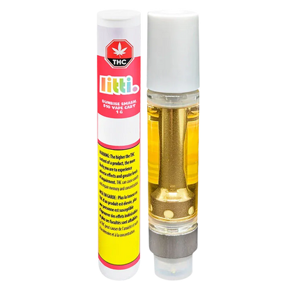 Front-facing photograph of a Sunrise Smash Vape Cartridge by Litti, showing the clear 1 g cartridge with golden oil beside its colorful white, pink, and yellow labeled tube.