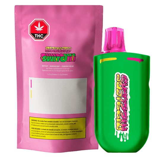 Close-up of the Switchit - Hawaiian Heat + Pearadise Dream Disposable Vape, showing its vibrant label and cylindrical shape against a dark background.