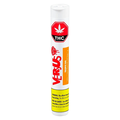 Straight-on view of a tall white tube labeled Tropic OG Liquid Diamonds Vape Cartridge by VERSUS, showing red THC symbol and yellow warning band.