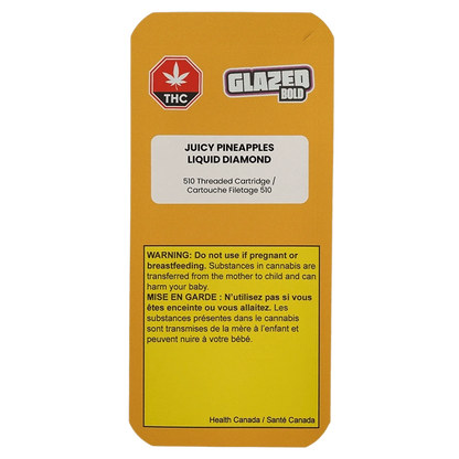 Portrait view of the mustard-yellow package labeled Juicy Pineapples Liquid Diamond Vape Cartridge with warning block and Glazed Bold logo.