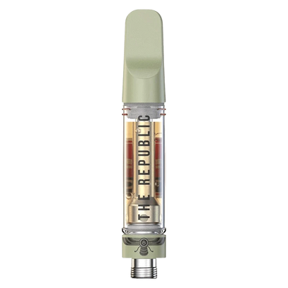 Top-down close-up of a green-tipped Black Label Vape Cartridge showing the clear chamber and "THE REPUBLIC" branding inside.