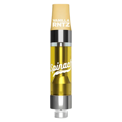 Straight-on close-up of a vanilla-colored Vanilla RNTZ Liquid Diamonds Vape Cartridge showing its clear golden tank and silver base.