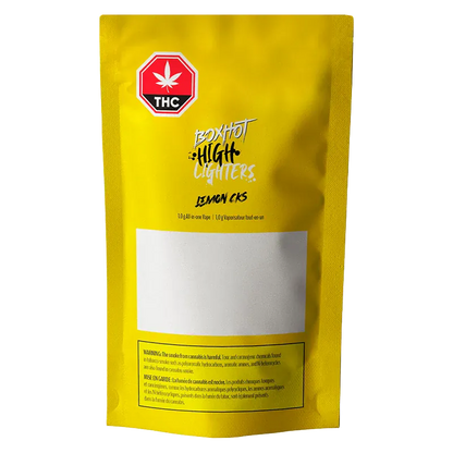 Front-facing shot of the bright yellow Highlighters Lemon Cks All-In-One Disposable Vape pouch with centered logo and blank white label.