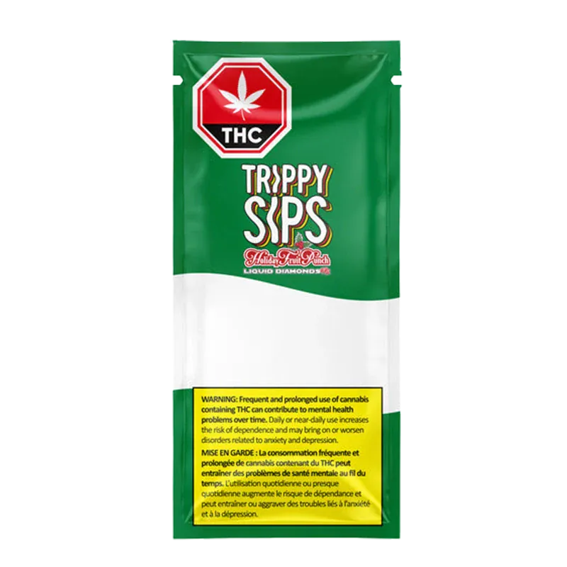Front-facing shot of the green and white packaging labeled "Trippy Sips Holiday Fruit Punch Diamond Vape Cartridge" with a red THC stop-sign logo and yellow warning box.