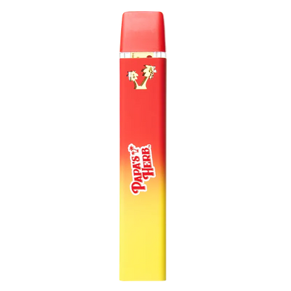 Straight-on studio shot of a red-to-yellow gradient Fruity Pbblz Liquid Diamond Disposable Vape with gold accents and white "Papa's Herb" logo.