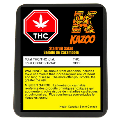 Top-down view of a black-packaged Starfruit Salad Disposable Vape with a red THC stop-sign logo, orange Kazoo branding, and a yellow bilingual warning panel.