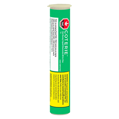 Vertical front view of a green tube labeled Coterie Hot Honey Liquid Diamonds Disposable Vape with warning panels and a THC symbol.