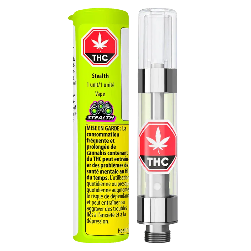 Front-facing shot of a clear cartridge next to neon green packaging labeled Stealth Vape Cartridge 1 g, both showing red THC stop-sign logos.