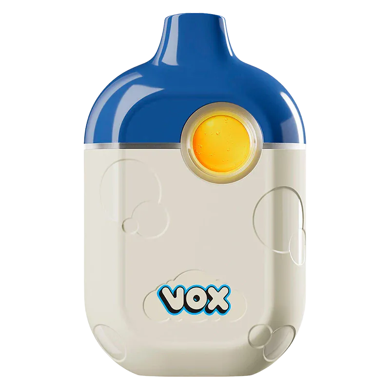 Front-facing shot of a two-tone Blue Raspberry Disposable Vape with a blue top, cream body, circular yellow mouthpiece, and "vox" logo near the base.