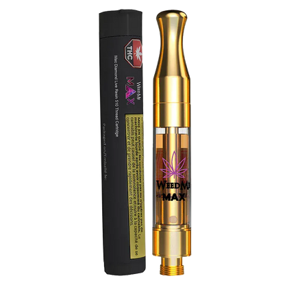 Angled studio shot of the Mac Diamond Live Resin Vape Cartridge standing next to its black cylindrical packaging, the gold cartridge showing amber oil and a purple leaf logo.