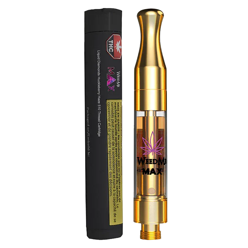 Straight-on product shot of a gold cartridge beside black packaging, showing the Liquid Diamonds Huckleberry Haze Vape Cartridge branding and purple leaf logo.