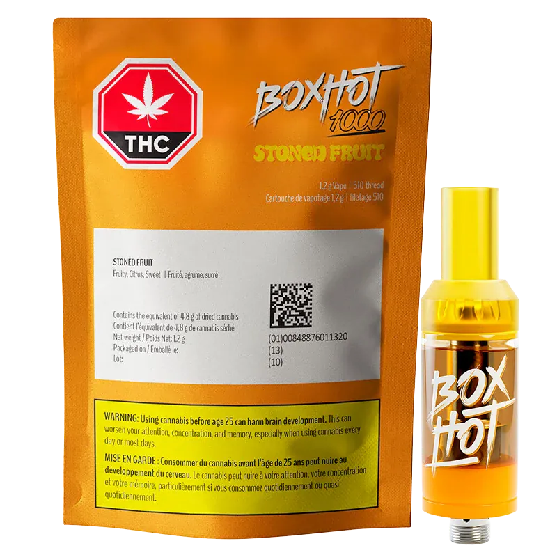 Front-facing shot of the BoxHot 1000 Stoned Fruit Vape Cartridge package and yellow cartridge against a white background.