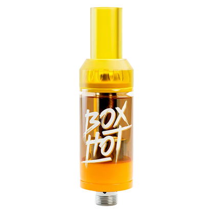Centered front view of the Stoned Fruit Vape Cartridge with translucent yellow housing and "BOX HOT" white script on a white background