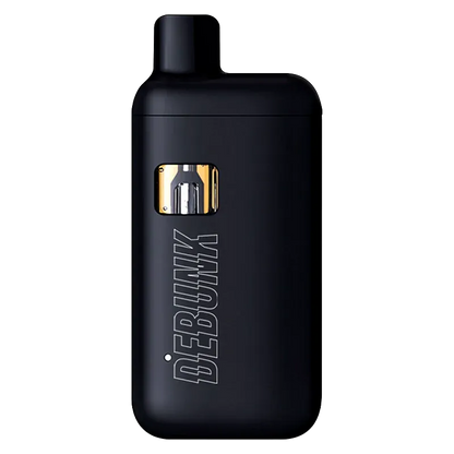 Straight-on view of the black Peach Crescendo Liquid Diamond Disposable Vape showing its rounded rectangular body, angled mouthpiece, small cartridge window, and vertical DEBUNK logo.