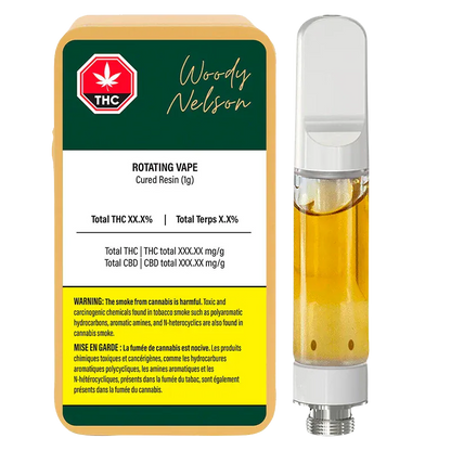 Right-side view of the Rotating Live Resin Vape Cartridge standing beside its Woody Nelson labeled 1g packaging, showing golden liquid and white mouthpiece