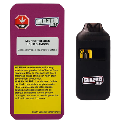 Packshot of the Midnight Berries Liquid Diamond Disposable Vape showing a magenta product box with warnings beside a black vape device with a small window and Glazed Bold logo.
