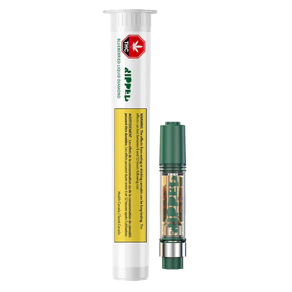 Vertical product shot of a Blueberried Liquid Diamond Vape Cartridge showing the clear 0.95 g cartridge with green mouthpiece beside its white tube packaging.