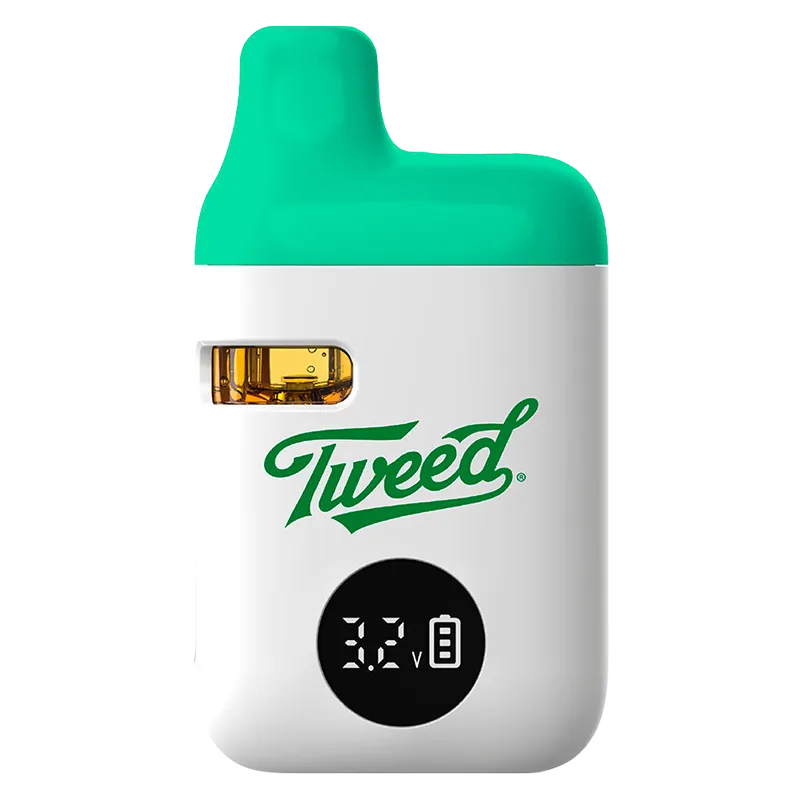 Front view of the Sour Green Apple Liquid Diamonds Disposable Vape by Tweed showing its white body, green mouthpiece, visible oil window and digital voltage display.