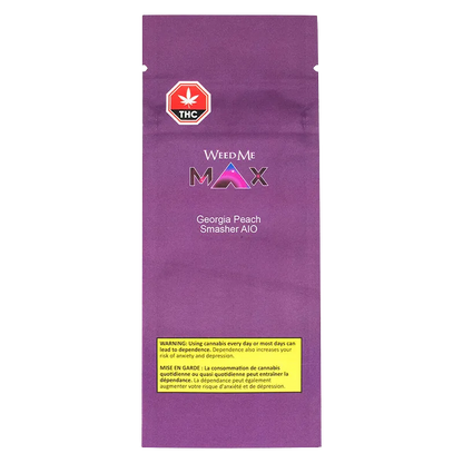 Straight-on view of the purple packet labeled "Georgia Peach Smasher Disposable Vape" showing a centered WeedMe MAX logo, THC symbol upper-left, and a yellow warning box near the bottom.