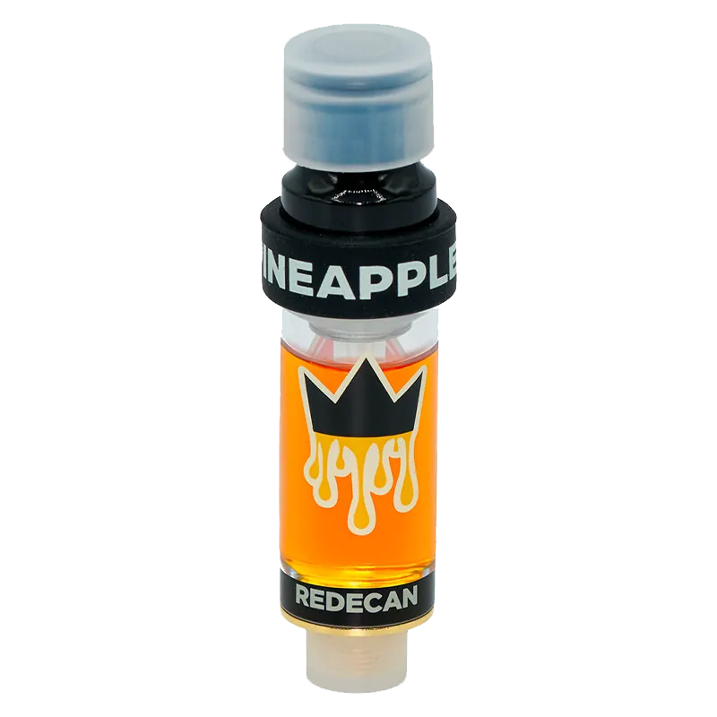 Centered upright against a white background, the Amped Live Resin Pineapple Express Vape Cartridge shows its clear glass chamber of amber oil, black crown logo, and bold "PINEAPPLE" band.