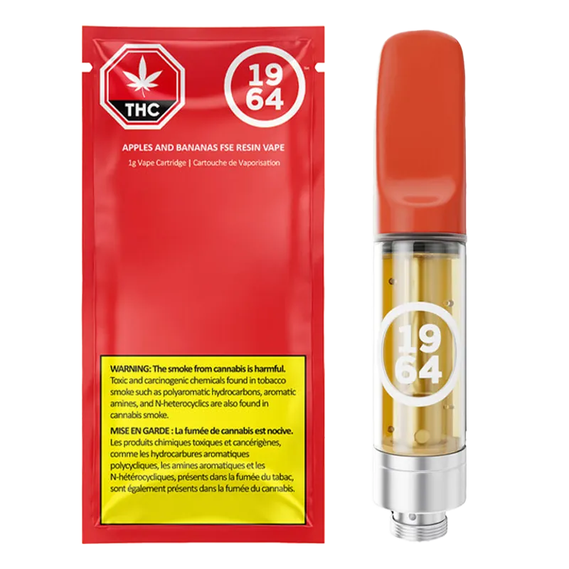 Product shot of a red Apples & Bananas Cured Resin Vape Cartridge package beside the cartridge with orange mouthpiece and clear oil chamber.