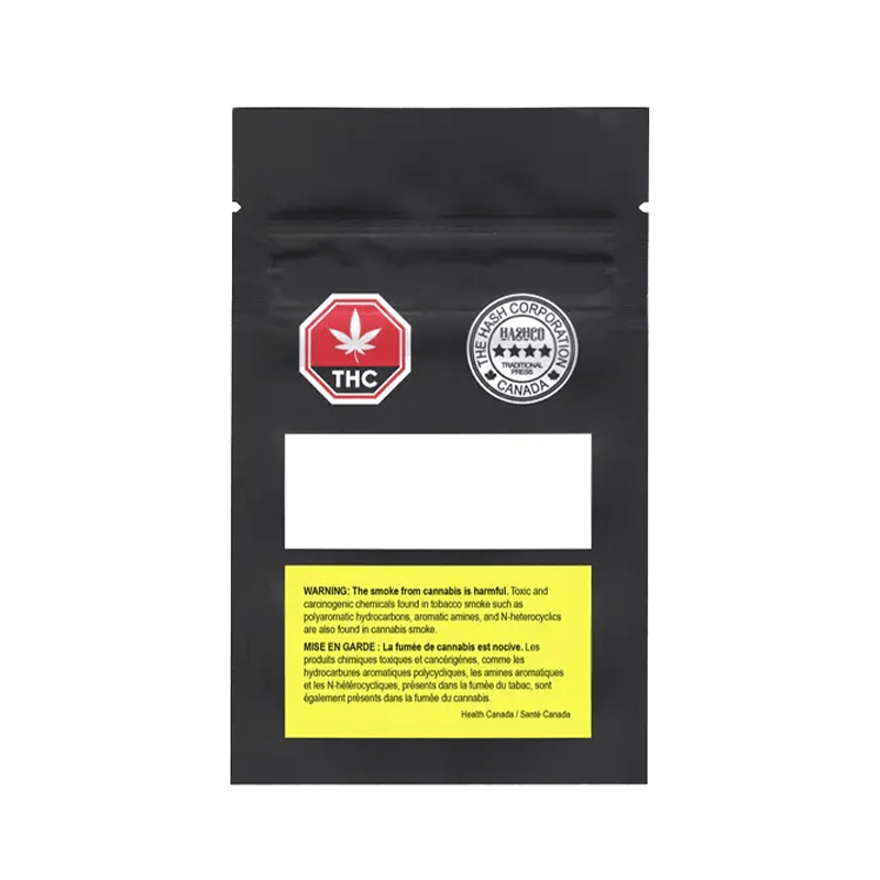 Close-up of Gold Seal Hash packaging, featuring a circular logo with gold accents on a dark background.