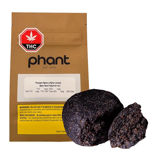 Black Afghan, a block of pressed hash with the "Phant" logo visible on its packaging, captured in a close-up shot.