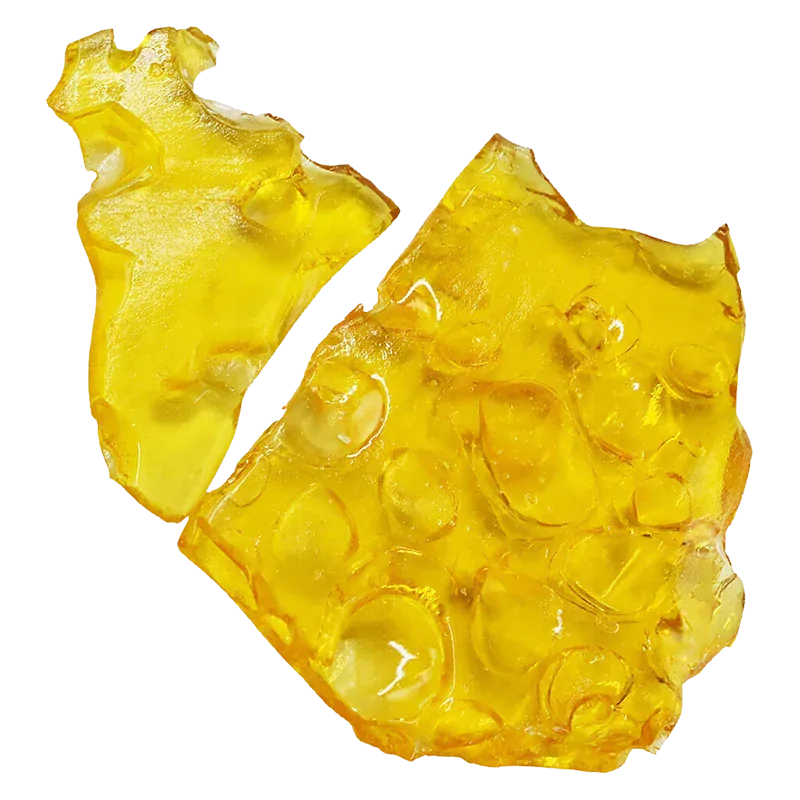 Top-down view of amber translucent shards of Blueberry Fuego Shatter glinting against a white background.