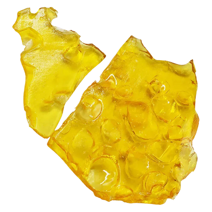 Top-down view of amber translucent shards of Blueberry Fuego Shatter glinting against a white background.